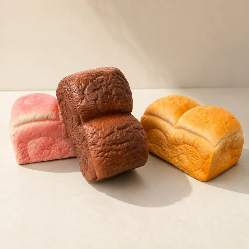 Squishy Realistic Slow Rise Bread Squishy Pink, realistisch broodje dat langzaam zijn vorm terugkrijgt