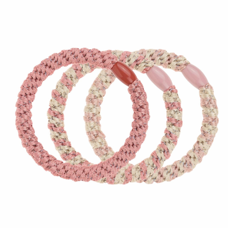 Invisibobble Twistar Blush Braids, set van drie geweven haarelastiekjes in roze tinten.